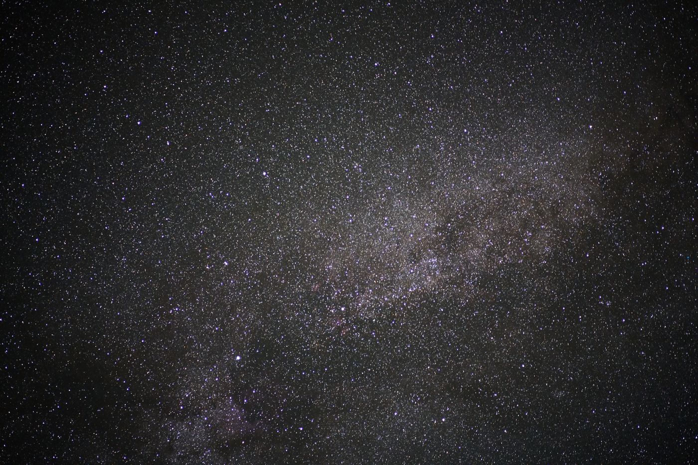A vast starry night sky, suggesting scattered points of light waiting to be joined